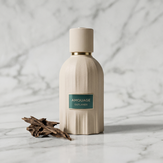 Amouage Outlands EDP centered on pale grey marble with dried agarwood, editorial studio