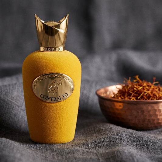 Sospiro Contralto EDP on charcoal linen with a small copper bowl of saffron threads