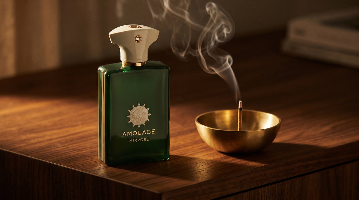 Amouage Purpose EDP on dark walnut console with a small brass incense bowl with smoke curling upward