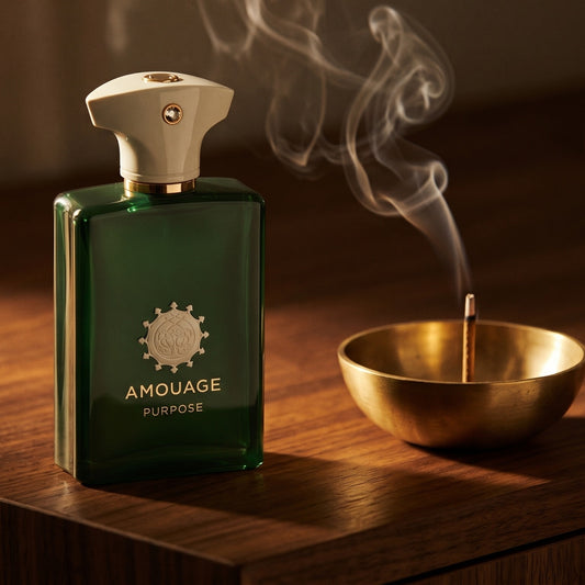 Amouage Purpose EDP on smoked-glass tabletop with a lacquered incense burner in mid-glow