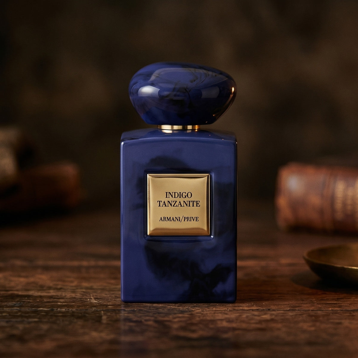 Armani/Prive Indigo Tanzanite on dark cherrywood with a tall beeswax taper casting warm light