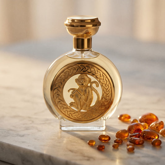 Boadicea Hanuman EDP on warm taupe marble with copal beads spilling from a small dish