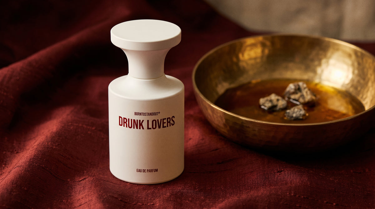 Borntostandout Drunk Lovers EDP on raw silk of oxblood color with a brass bowl with ambergris tincture