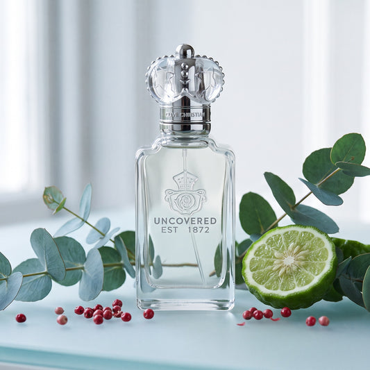 Clive Christian Uncovered on pale frosted glass with eucalyptus, bergamot and pink peppercorns