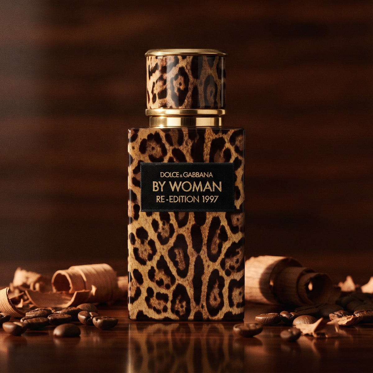 Dolce & Gabbana By Woman Re-Edition EDP on dark polished sandalwood with coffee beans and sandalwood