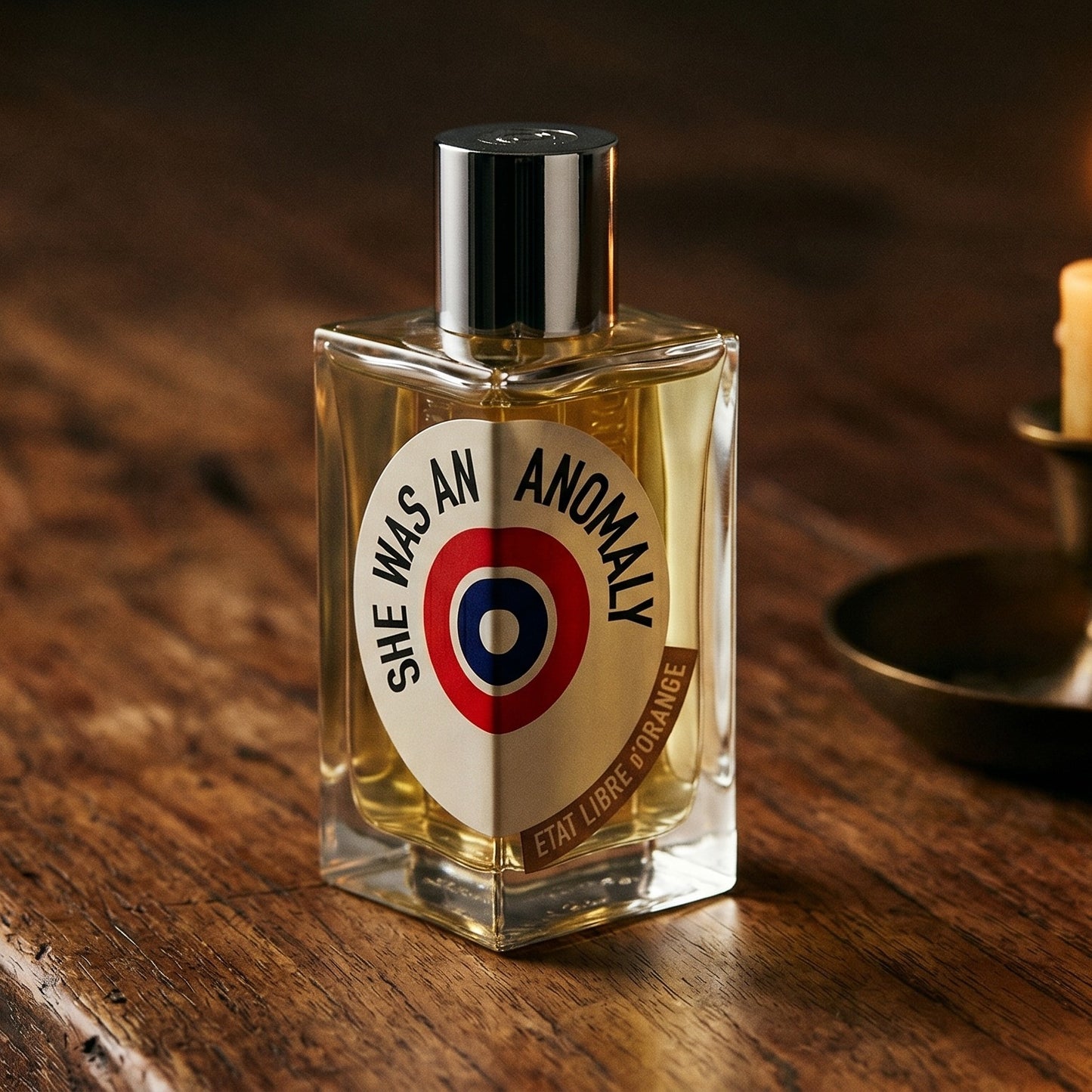 Etat Libre She Was an Anomaly EDP on aged maple with a slender candlestick and drifting smoke