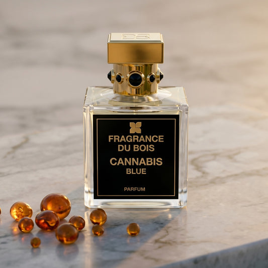 Fragrance Du Bois Cannibis Blue on polished limestone with benzoin resin pebbles arranged loosely