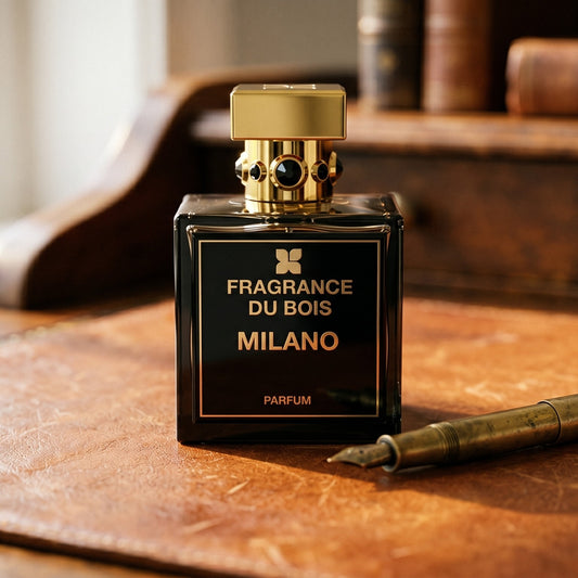 Fragrance Du Bois Milano on vintage oxblood leather chair arm with a folded silk scarf