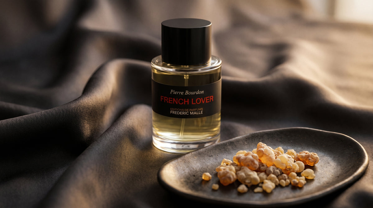 Frederic Malle French Lover EDP on charcoal silk with frankincense resin granules in a small saucer