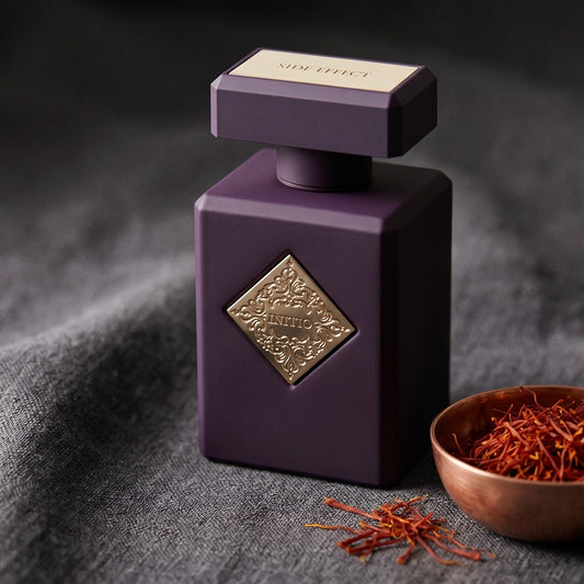 Initio Side Effect EDP on slate-grey fabric with a pinch of black peppercorns scattered