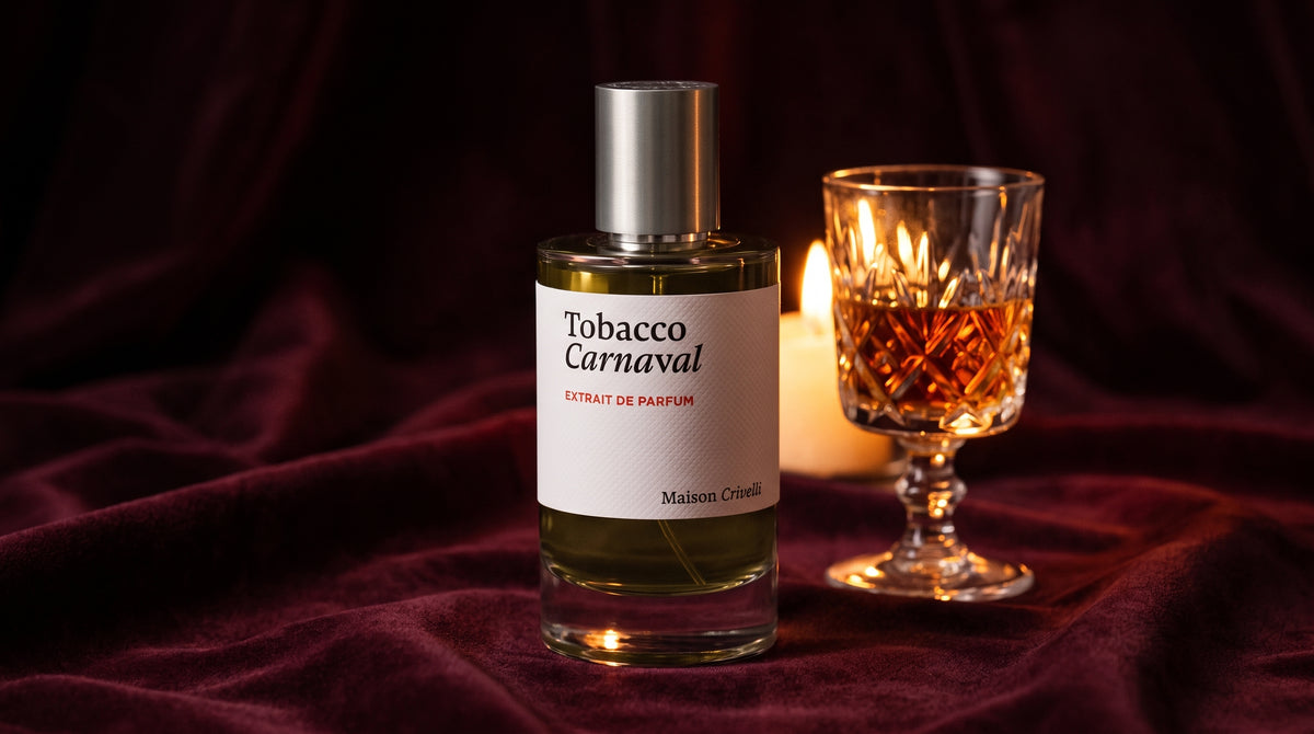 Maison Crivelli Tobacco Carnaval Extrait de Parfum on deep burgundy velvet with a glass of amber liqueur