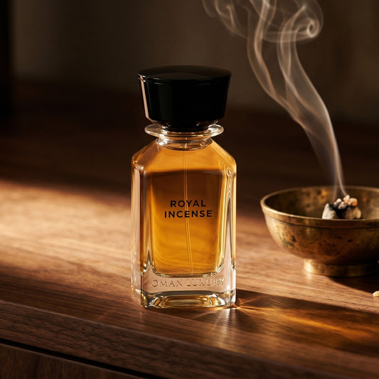 Oman Luxury Royal Incense EDP on black marble with a tall brass incense holder, smoke trailing diagonally