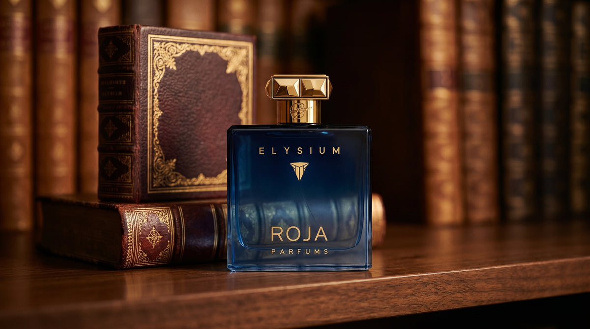 Roja Elysium Parfum EDP on dark walnut library shelf with a leather-bound book with gold foil