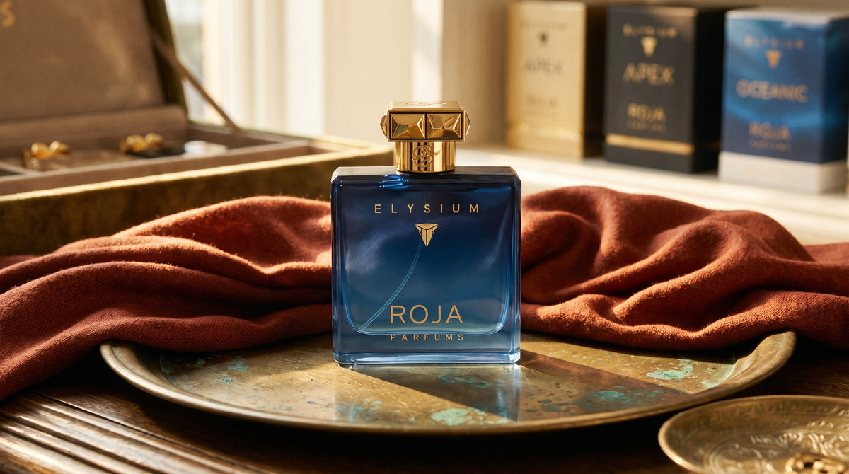 Roja Elysium Pour Femme EDP on aged brass tray with a folded pashmina in rust tone