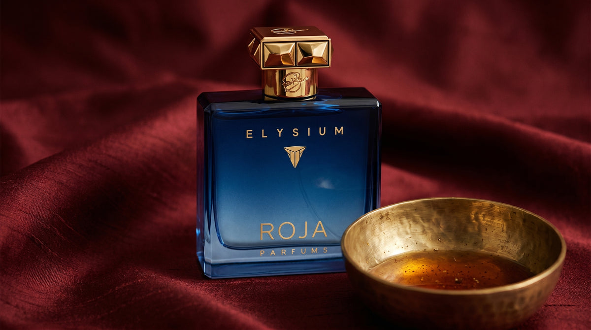 Roja Scandal Pour Homme Parfum on raw silk of oxblood color with a brass bowl with ambergris tincture