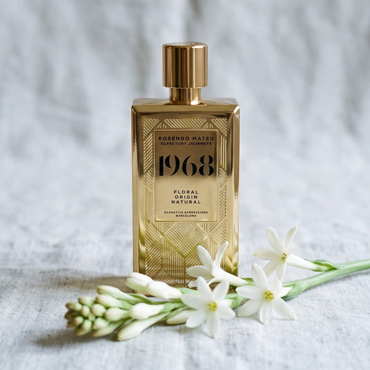 Rosendo Mateu 1968 EDP on bleached linen with a single tuberose stem laid flat