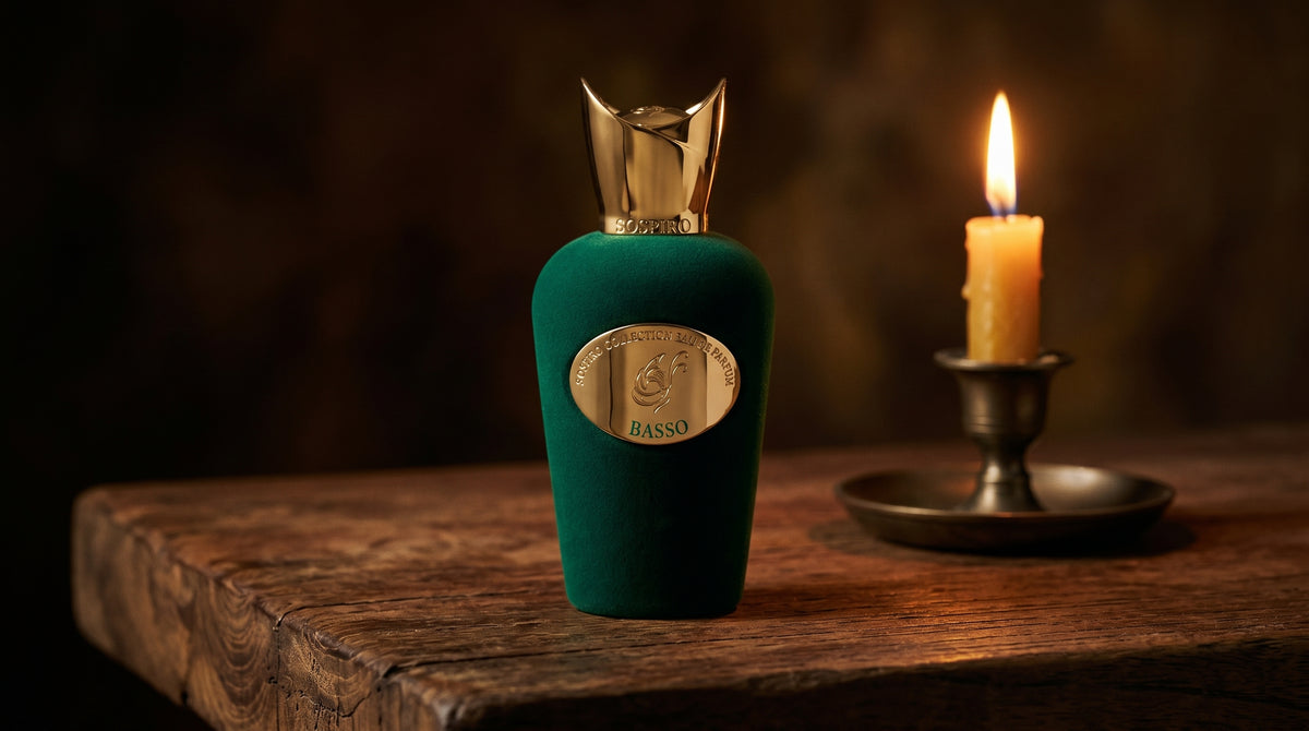 Sospiro Basso EDP on aged teak with a candle burning gently to frame-right