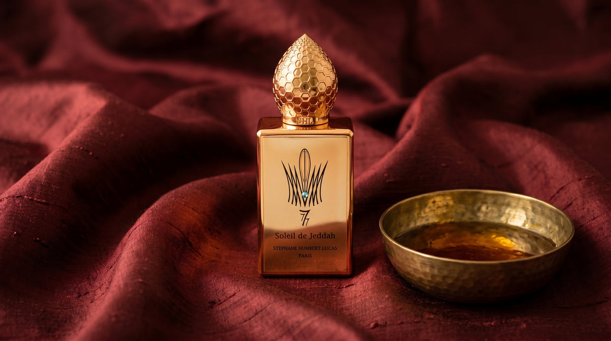 Stephane Humbert Lucas 777 Soleil de Jeddah Mango Kiss on raw silk of oxblood color with a brass bowl with ambergris tincture