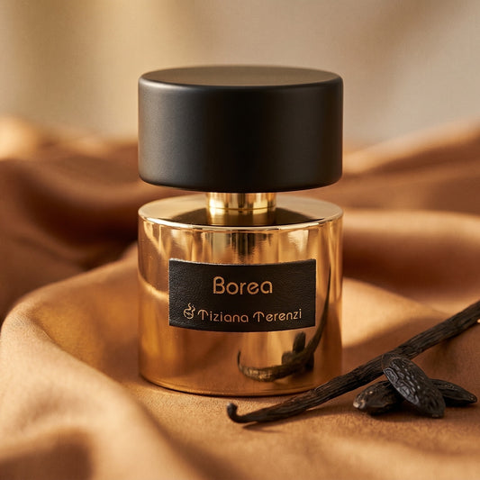 Tiziana Terenzi Borea EDP on warm caramel silk with a vanilla pod and tonka bean beside the bottle
