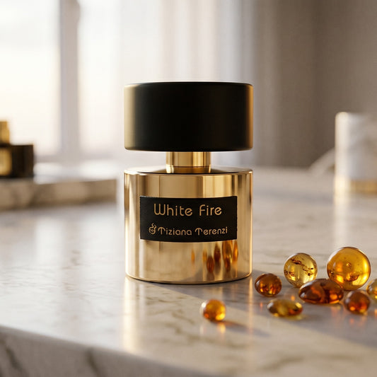 Tiziana Terenzi White Fire on warm ivory travertine with labdanum chunks clustered by the base