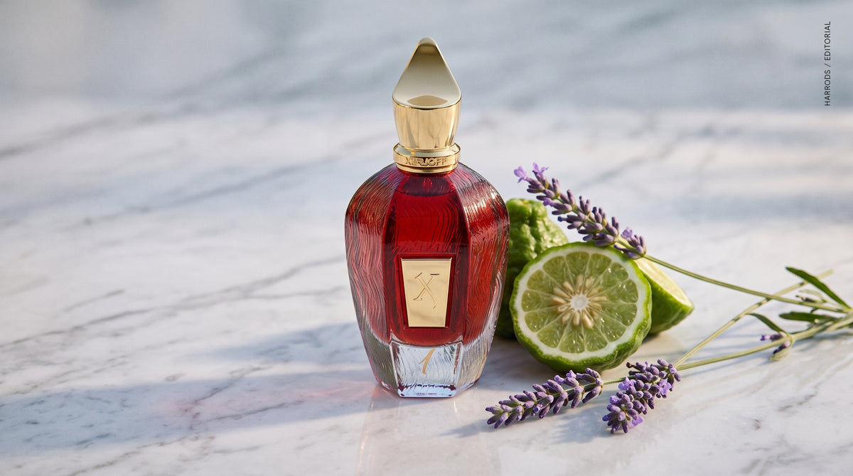 Xerjoff 1 One Red Parfum - UAE Exclusive Dubai Boutique Edition on pale grey marble with a split bergamot and two sprigs of fresh lavender