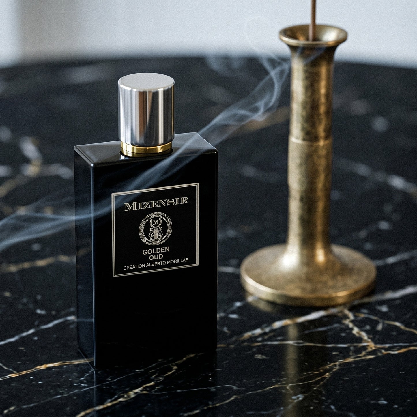 Mizensir Golden Oud EDP on black marble with a tall brass incense holder, smoke trailing diagonally