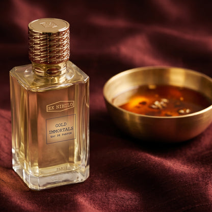 Ex Nihilo Gold Immortals EDP on raw silk of oxblood color with a brass bowl with ambergris tincture