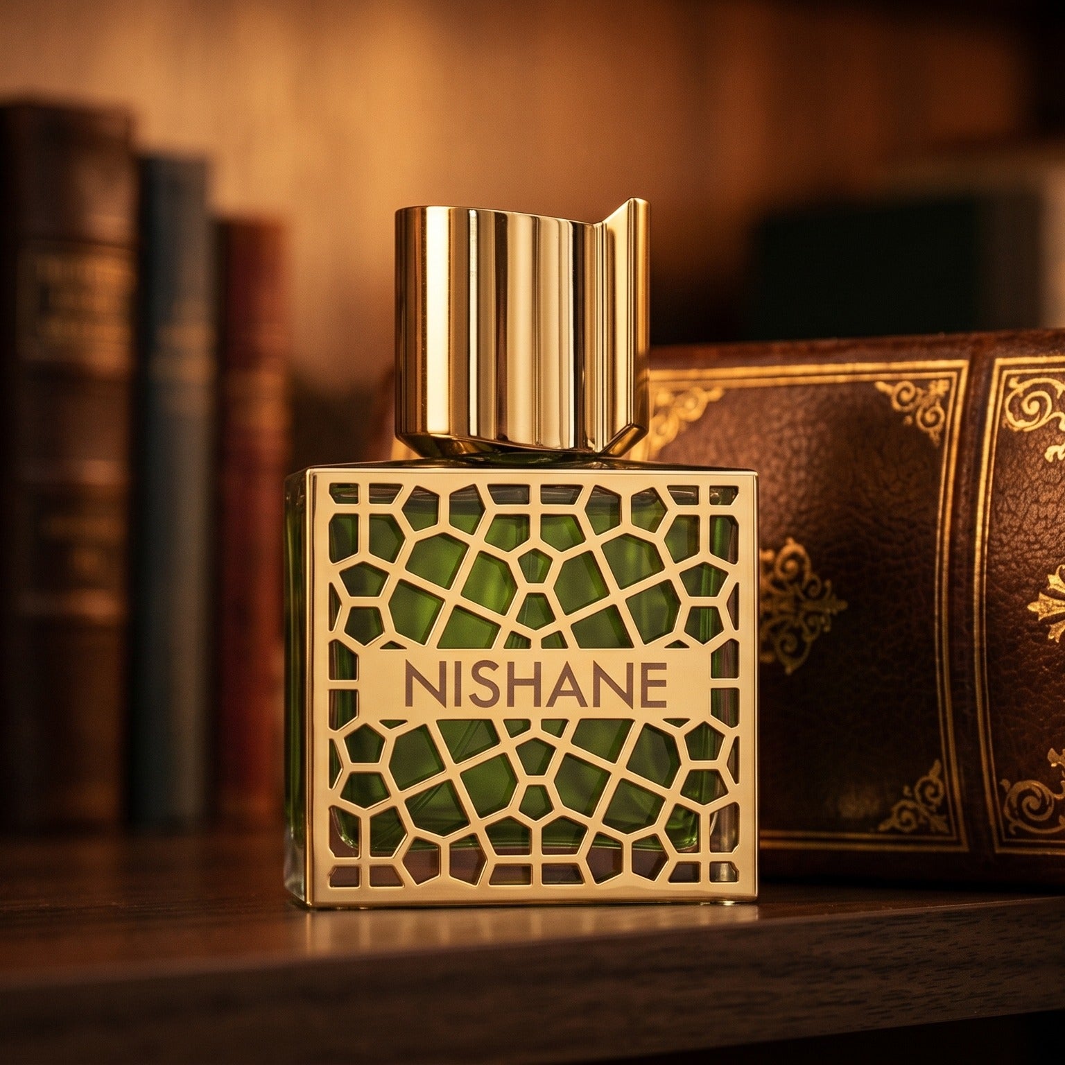 Nishane Shem EDP on dark walnut library shelf with a leather-bound book with gold foil
