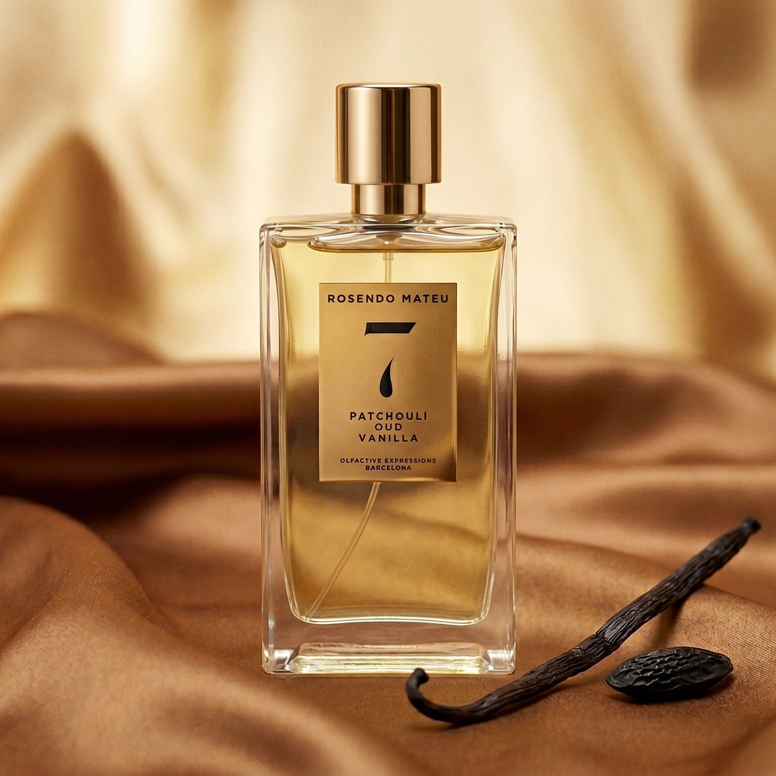 Rosendo Mateu No 7 EDP on warm caramel silk with a vanilla pod and tonka bean beside the bottle