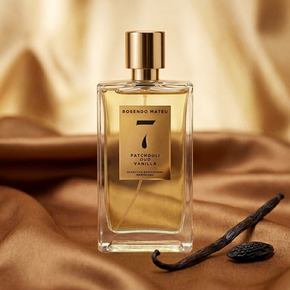 Rosendo Mateu No 7 EDP on warm caramel silk with a vanilla pod and tonka bean beside the bottle
