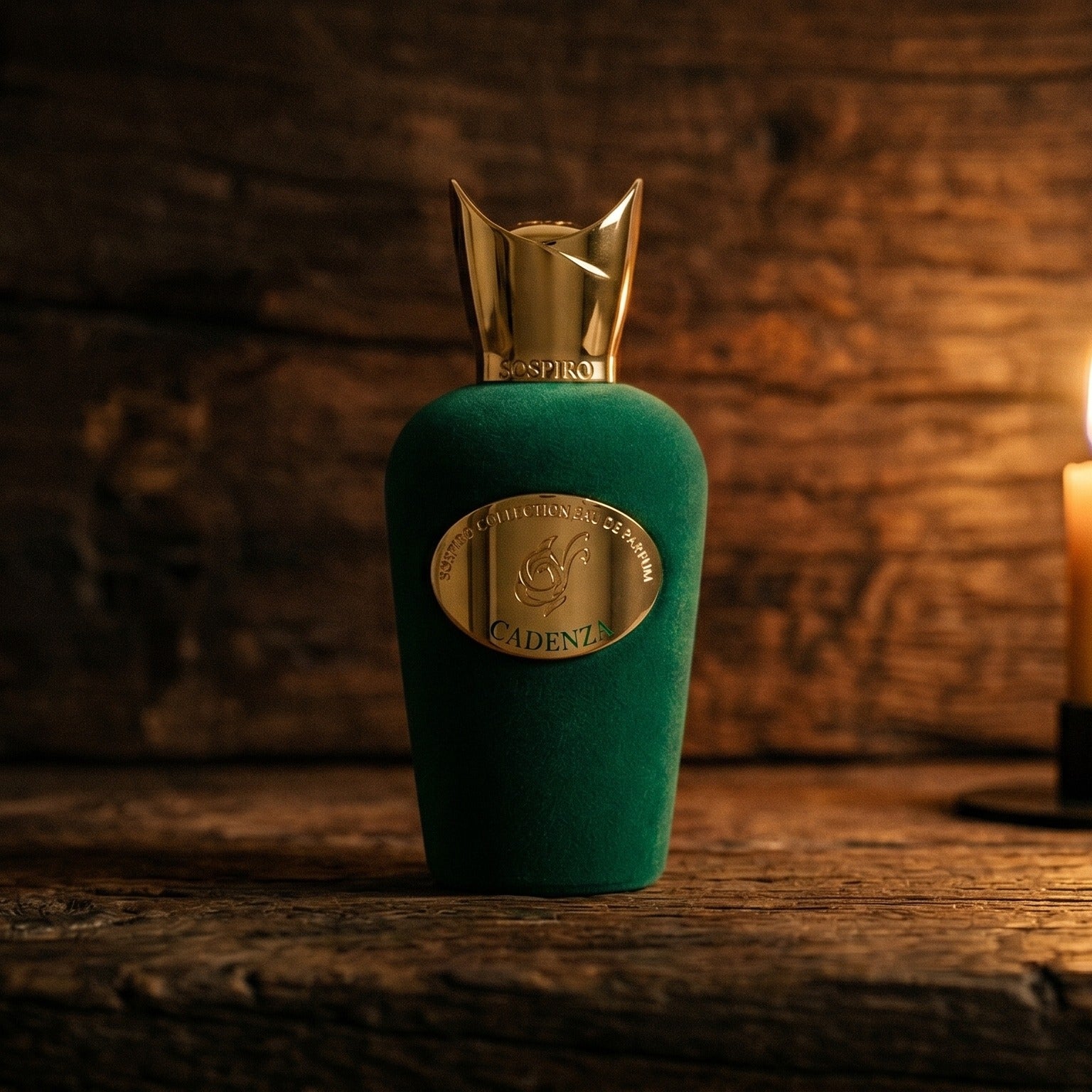 Sospiro Cadenza EDP on aged teak with a candle burning gently to frame-right
