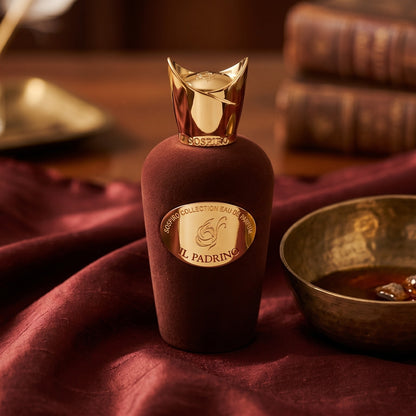 Sospiro IL Padrino EDP on raw silk of oxblood color with a brass bowl with ambergris tincture