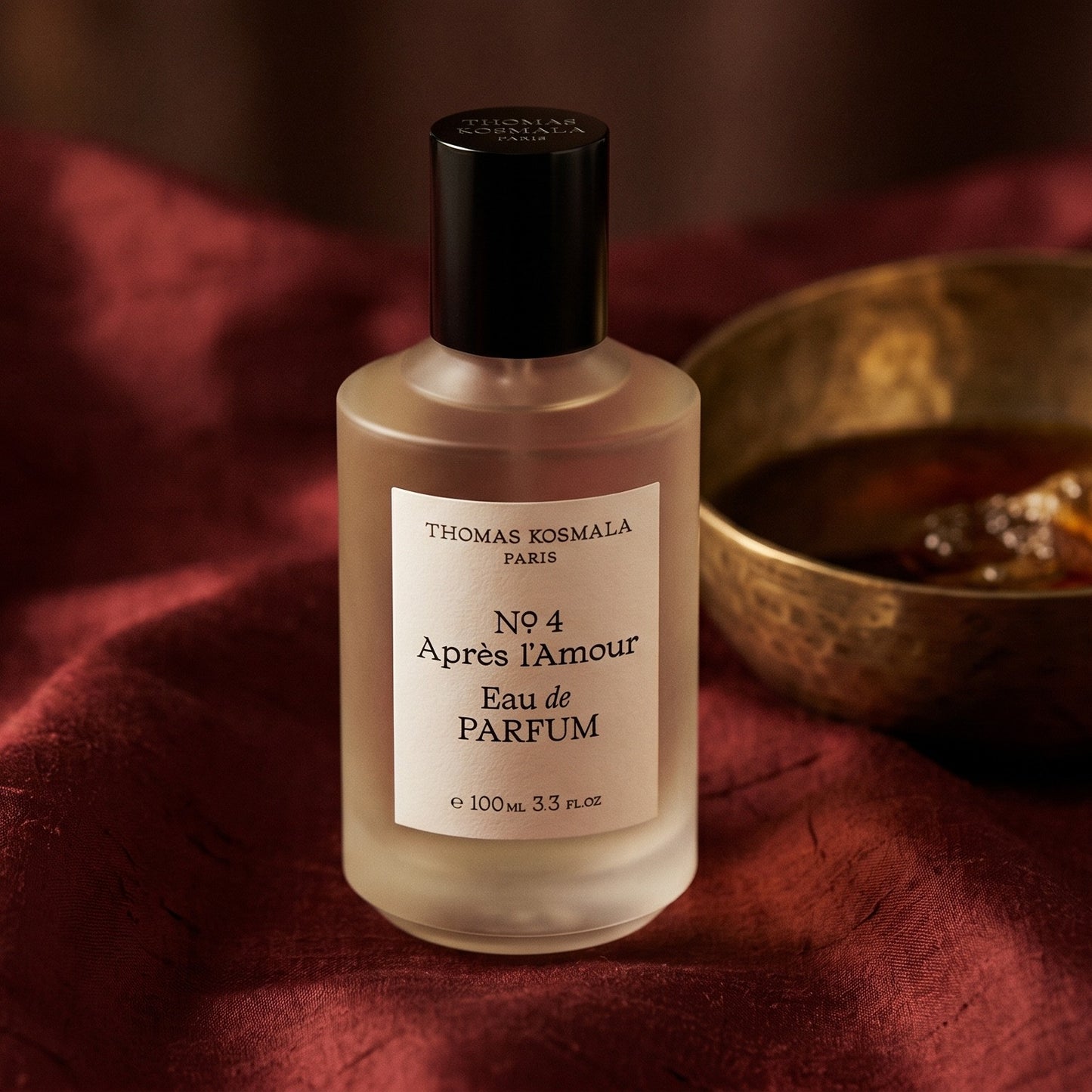 Thomas Kosmala Apres LAmour No 4 EDP on raw silk of oxblood color with a brass bowl with ambergris tincture