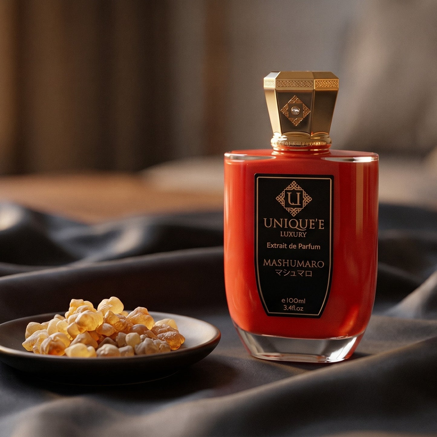 Unique Luxury Mashumaro Extrait on charcoal silk with frankincense resin granules in a small saucer