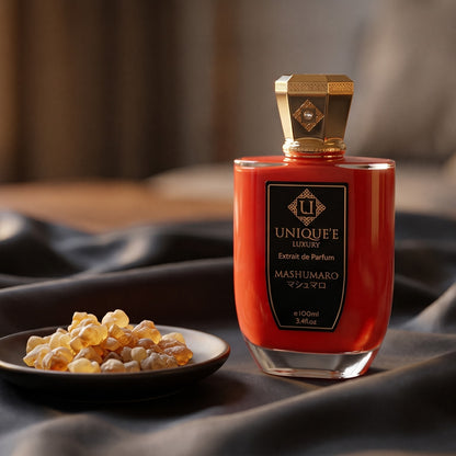 Unique Luxury Mashumaro Extrait on charcoal silk with frankincense resin granules in a small saucer