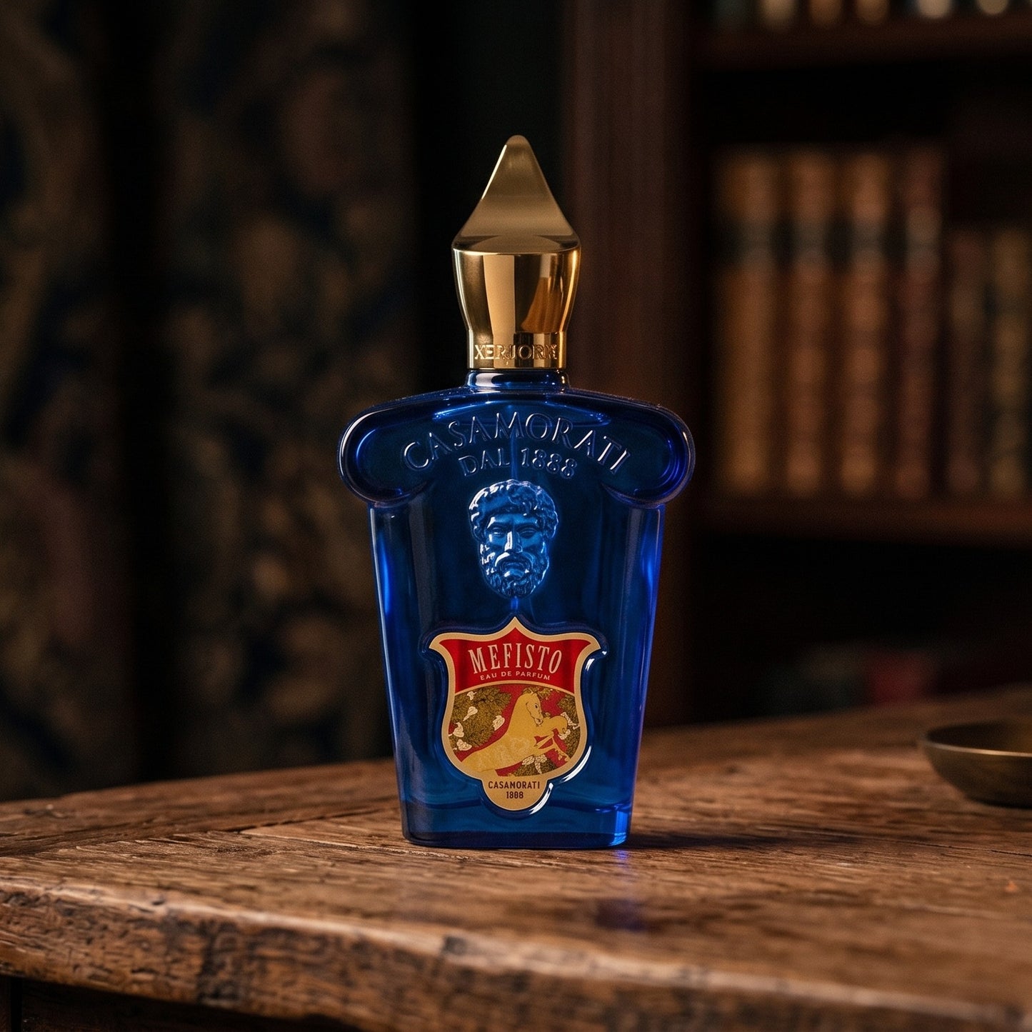 Xerjoff Mefisto EDP on aged teak with a candle burning gently to frame-right