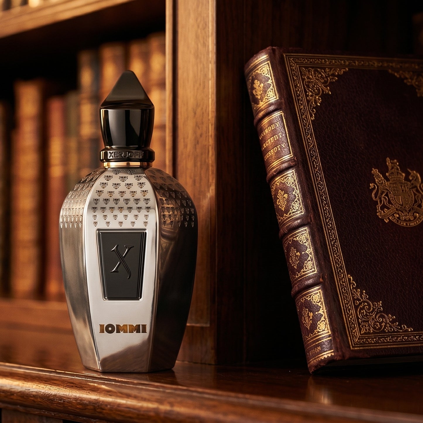 Xerjoff Monkey Special Tony Iommi EDP on dark walnut library shelf with a leather-bound book with gold foil