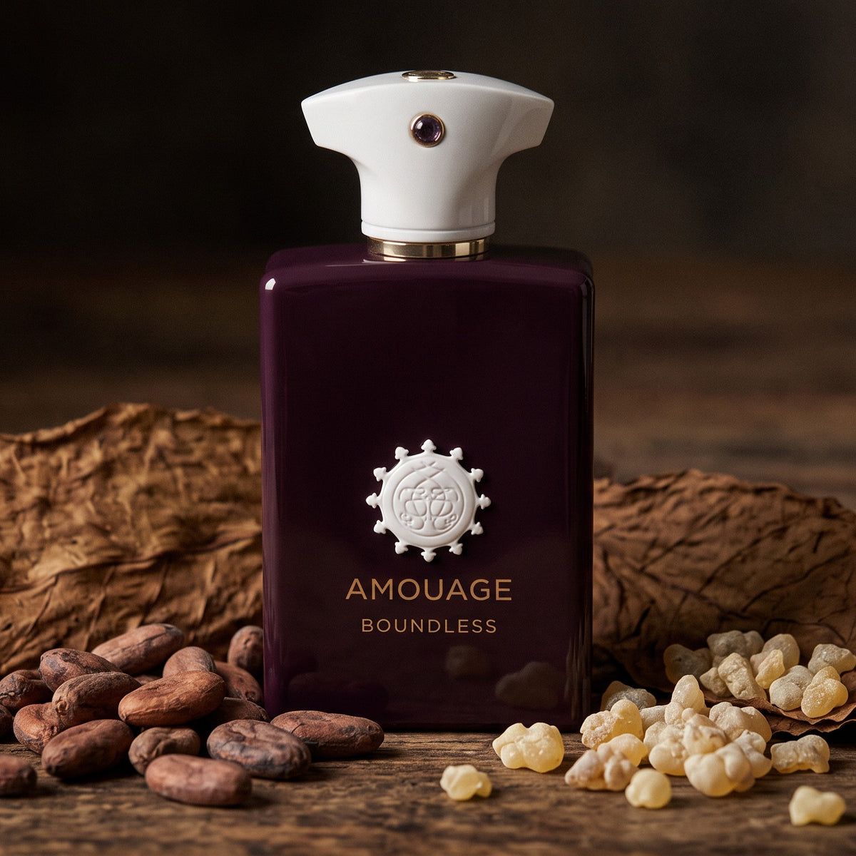Amouage Boundless EDP on dark aged wood with cocoa beans, tobacco leaves and frankincense