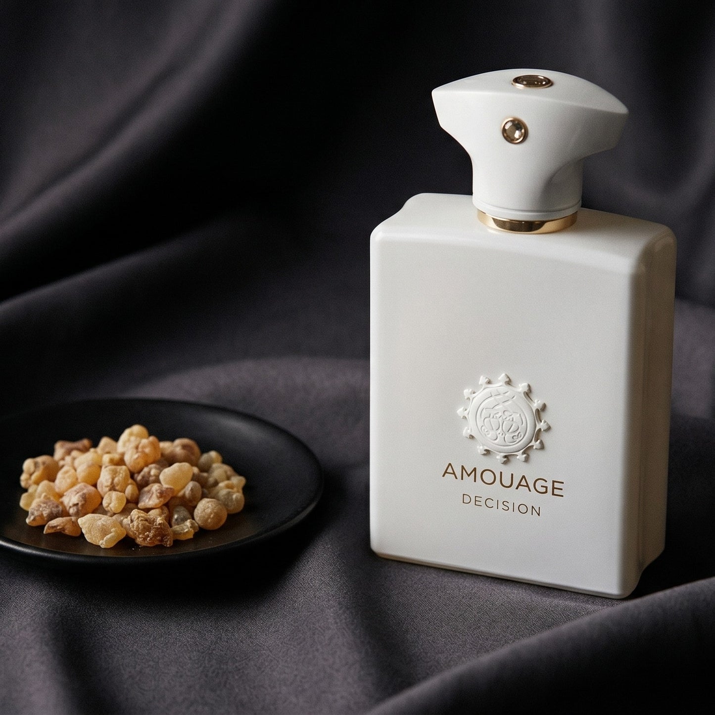 Amouage Decision EDP on deep indigo silk with a tiny copper bowl of myrrh pellets