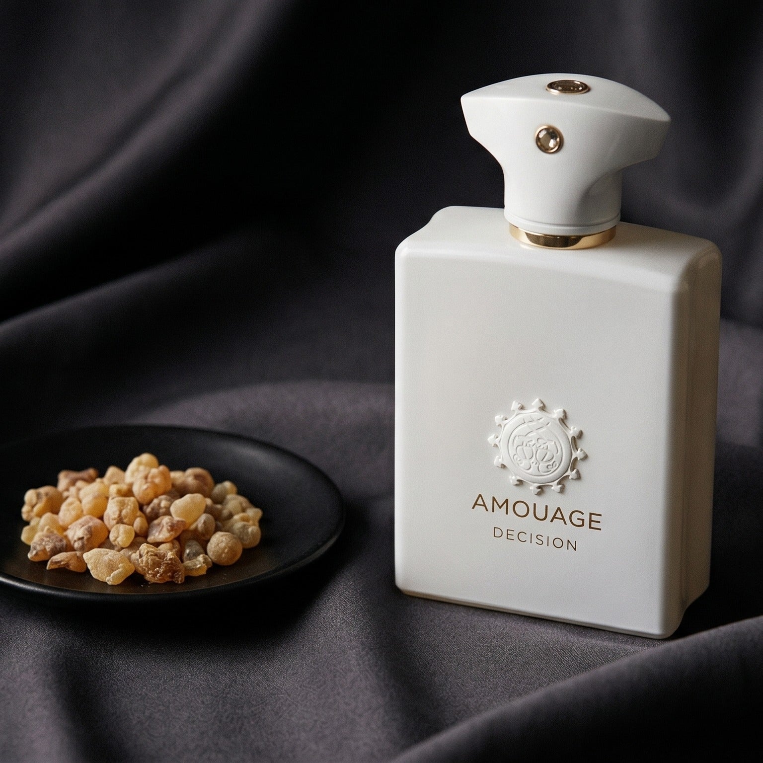 Amouage Decision EDP on deep indigo silk with a tiny copper bowl of myrrh pellets