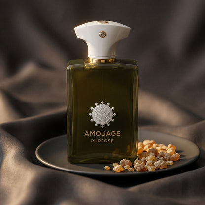 Amouage Purpose EDP on burnt-orange silk with smoldering agarwood on a stone dish