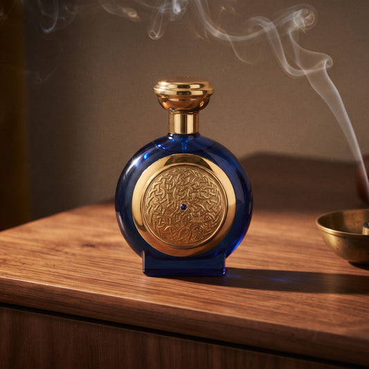 Boadicea the Victorious Blue Sapphire EDP on dark walnut console with a small brass incense bowl with smoke curling upward