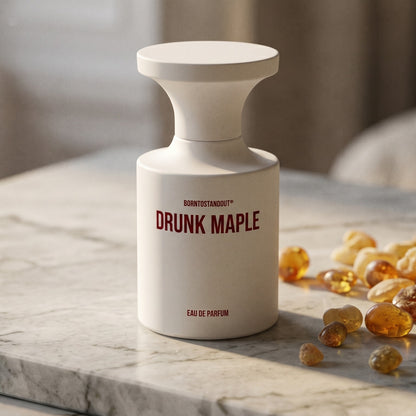 Borntostandout Drunk Maple EDP on polished limestone with benzoin resin pebbles arranged loosely