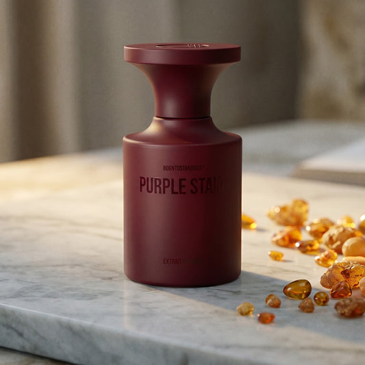 Borntostandout Purples Stain Extrait Extreme on polished limestone with benzoin resin pebbles arranged loosely