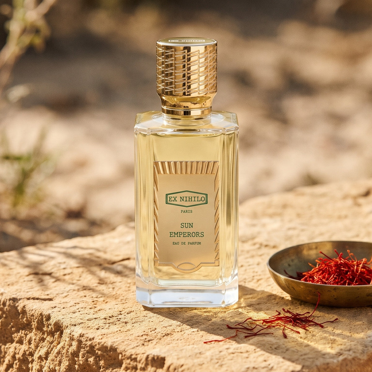 Ex Nihilo Sun Emperors EDP - Doha Exclusive on warm sandstone with saffron threads in a brass dish