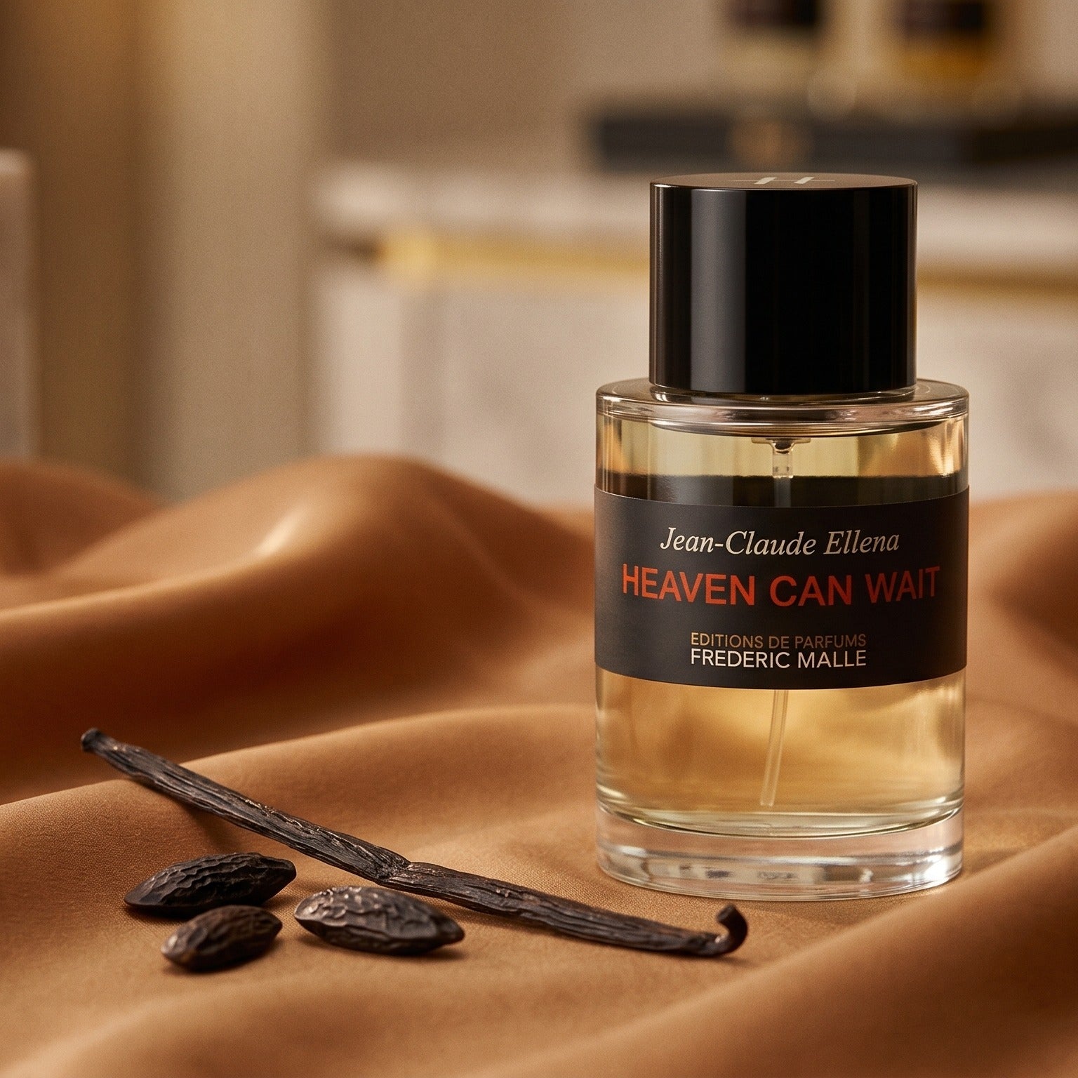Frederic Malle Heaven Can Wait EDP on cream-colored silk with a split vanilla bean and cocoa nibs