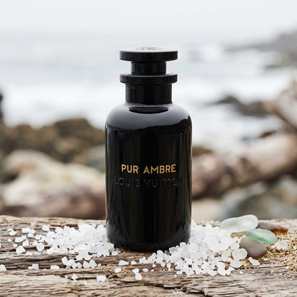 Louis Vuitton Pur Ambre - Pure Perfumes on weathered driftwood with driftwood and sea salt