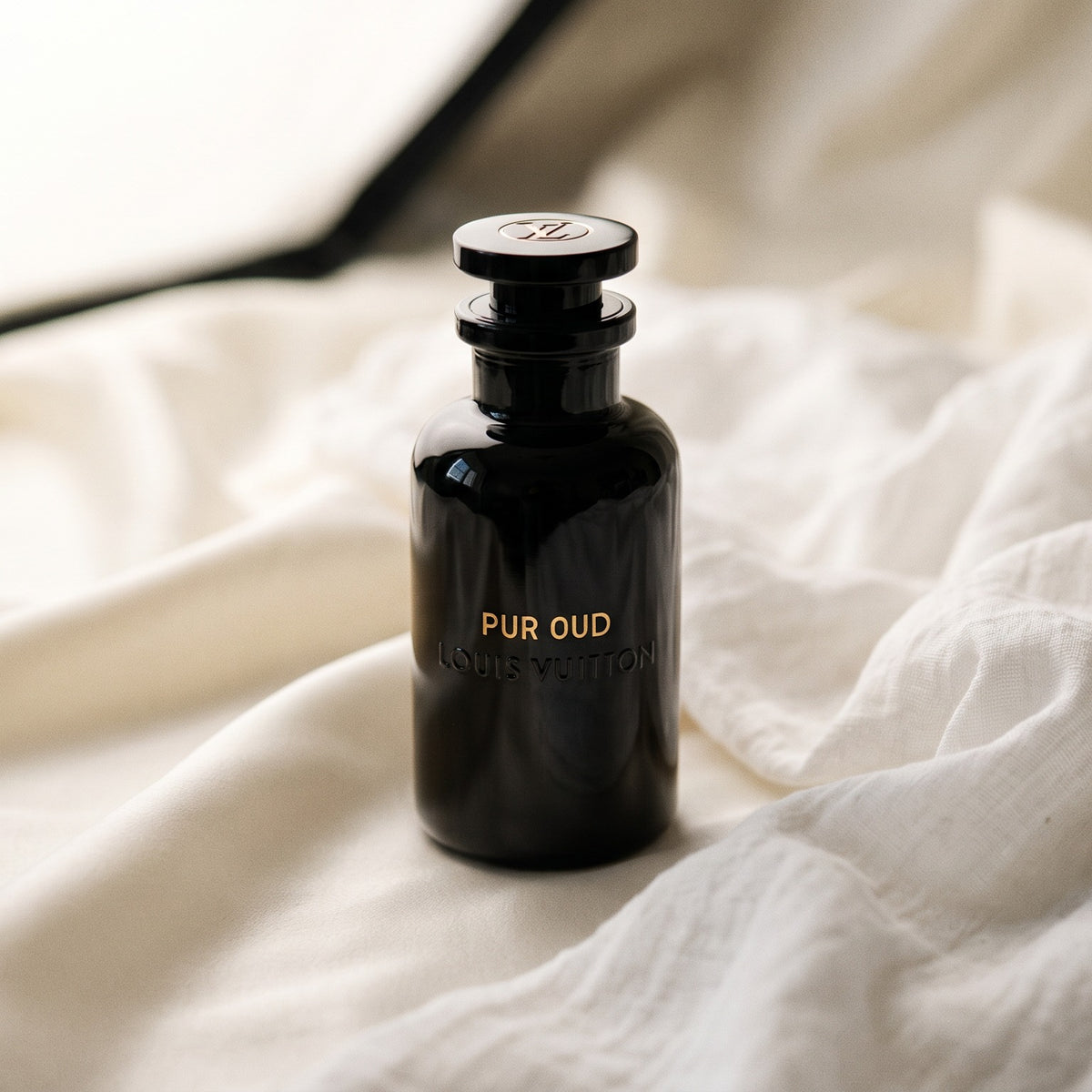 Louis Vuitton Pur Oud - Pure Perfumes on soft ivory silk with white cotton and silk