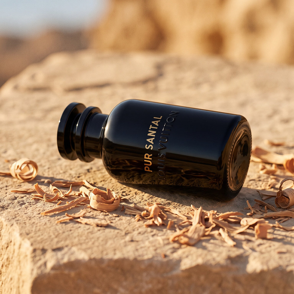 Louis Vuitton Pur Santal - UAE Exclusive on warm beige stone with sandalwood shavings