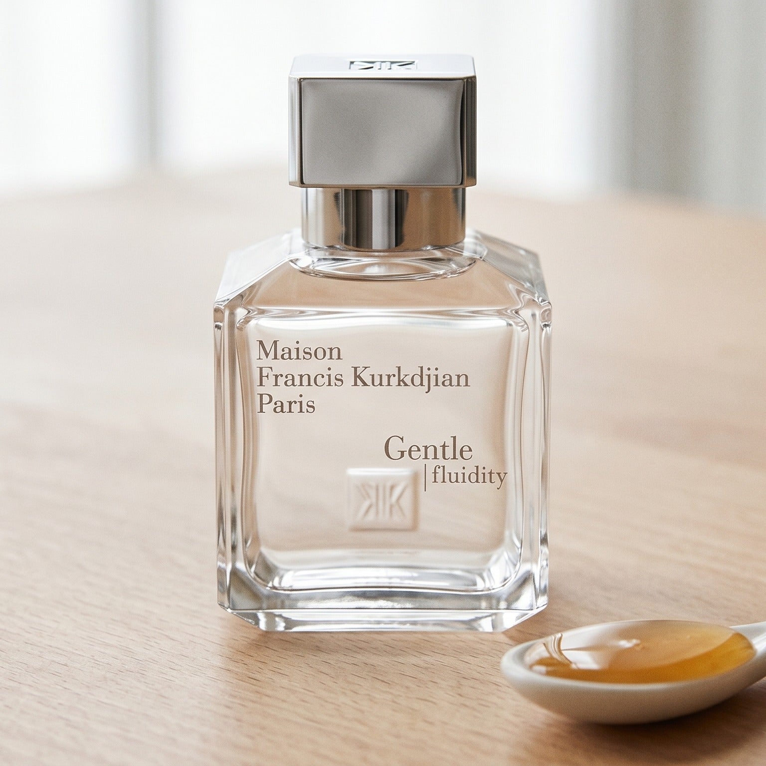 Maison Francis Kurkdjian (MFK) Gentle Fluidity Silver on cream-painted plank with a porcelain dish of crème brûlée